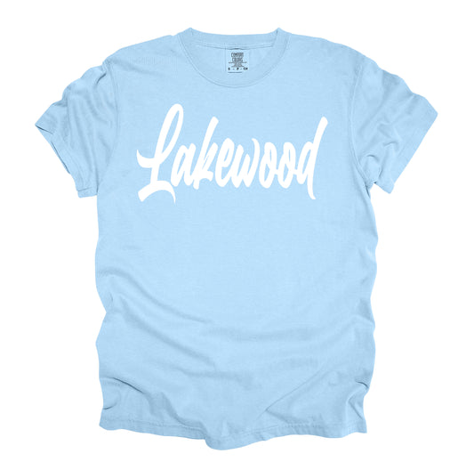 Cursive Lakewood Light Blue Lakewood Lancers on Premium Comfort Colors short sleeve tee